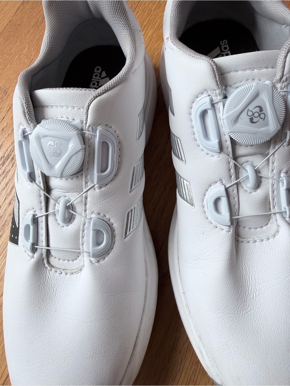adidas Kids White Sneakers with Silver Stripe Accents and Dial Closure